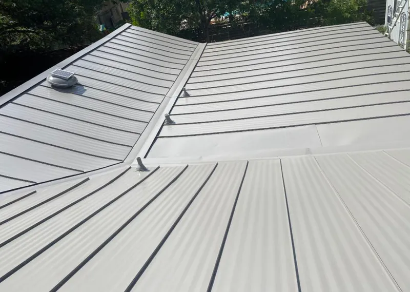 Solar attic fan installed on a metal roof for Roof Ventilation in Sierra Madre